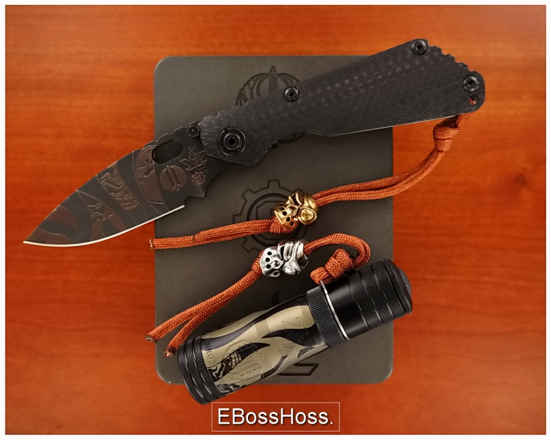   A Knife, a Light, 2 Beads and a Tank of a Box